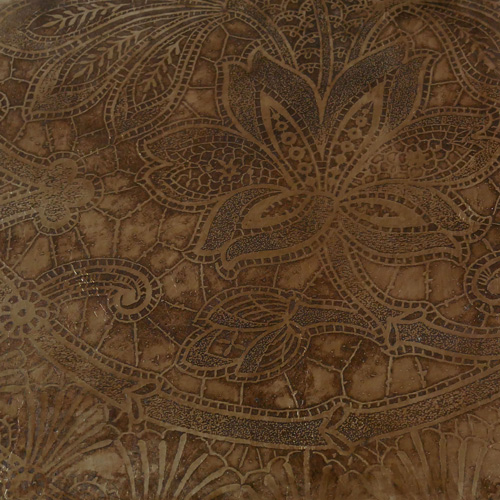 Embossed lace leather